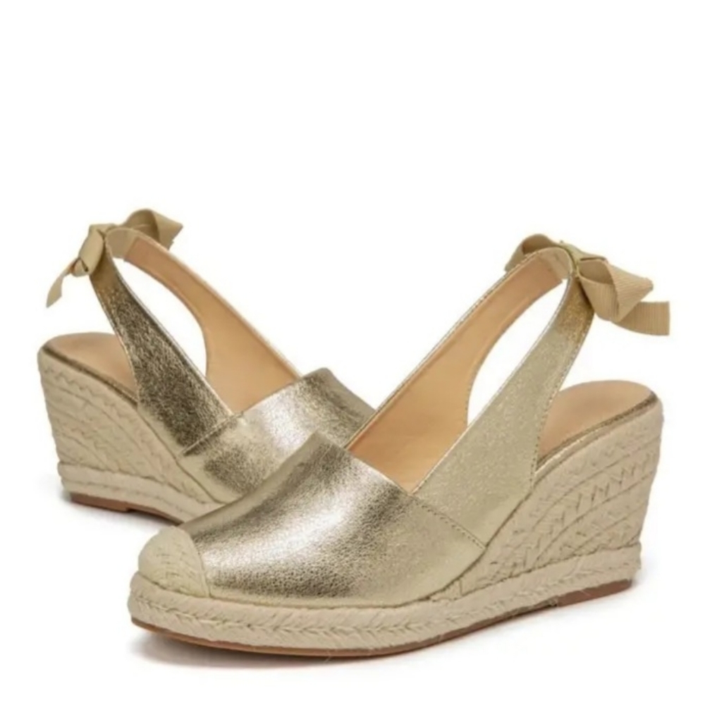 New pair of wedge heel sandals